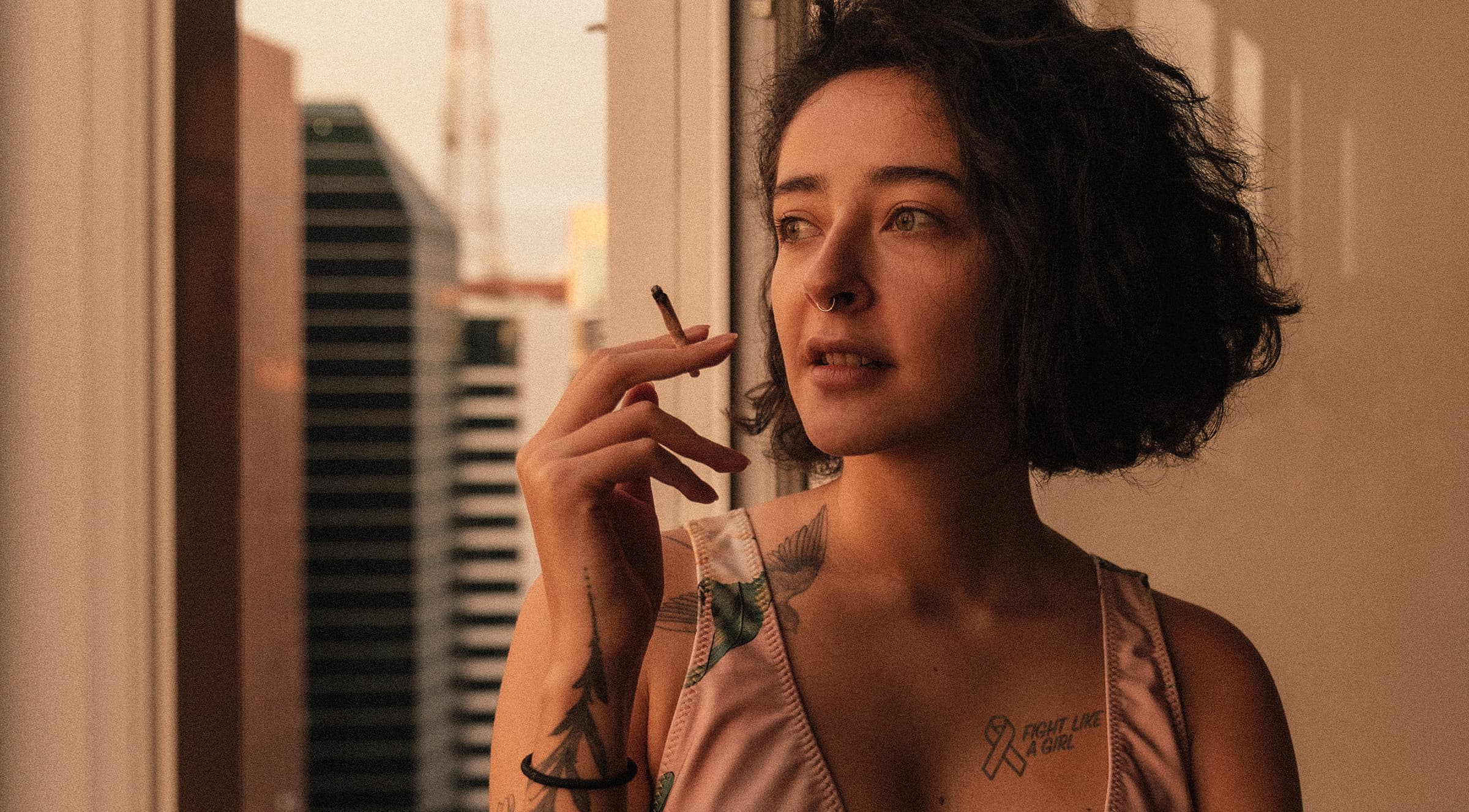 Woman smoking cannabis joint