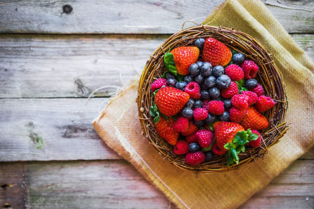 Berries on wooden background