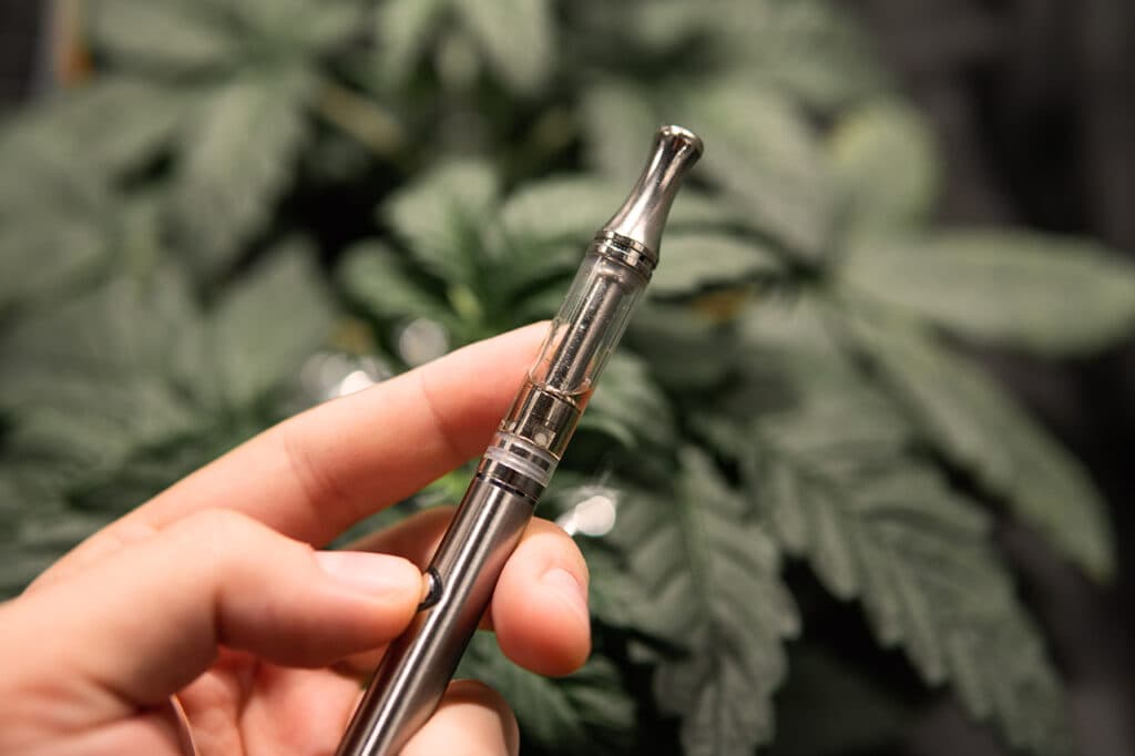 cannabis concentrates or CBD vape juice. Weed Vape Pens for THC Oil . CBD vape oils. simple electronic device.