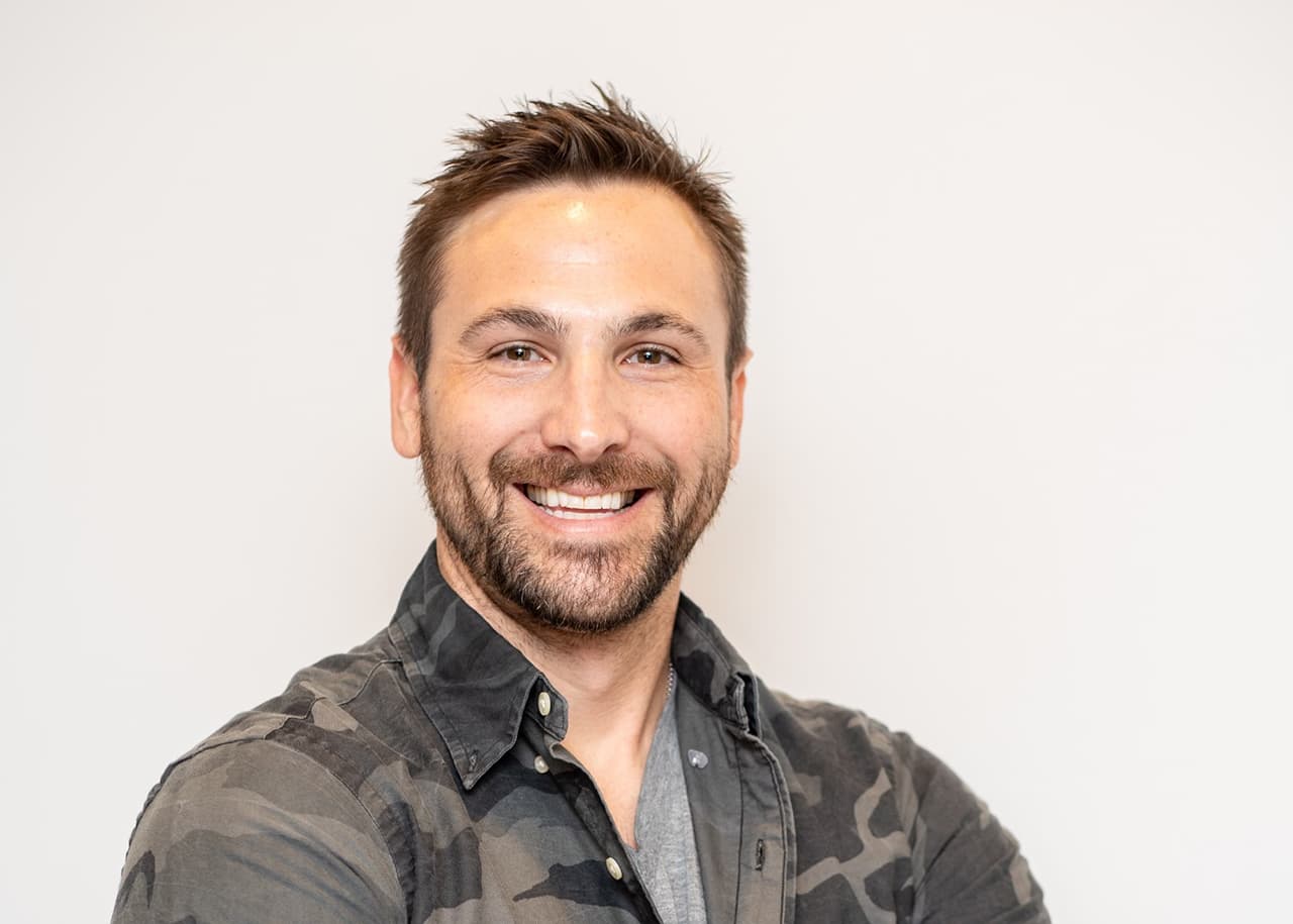 portrait of CEO of Highsman Eric Hammond in front of white background