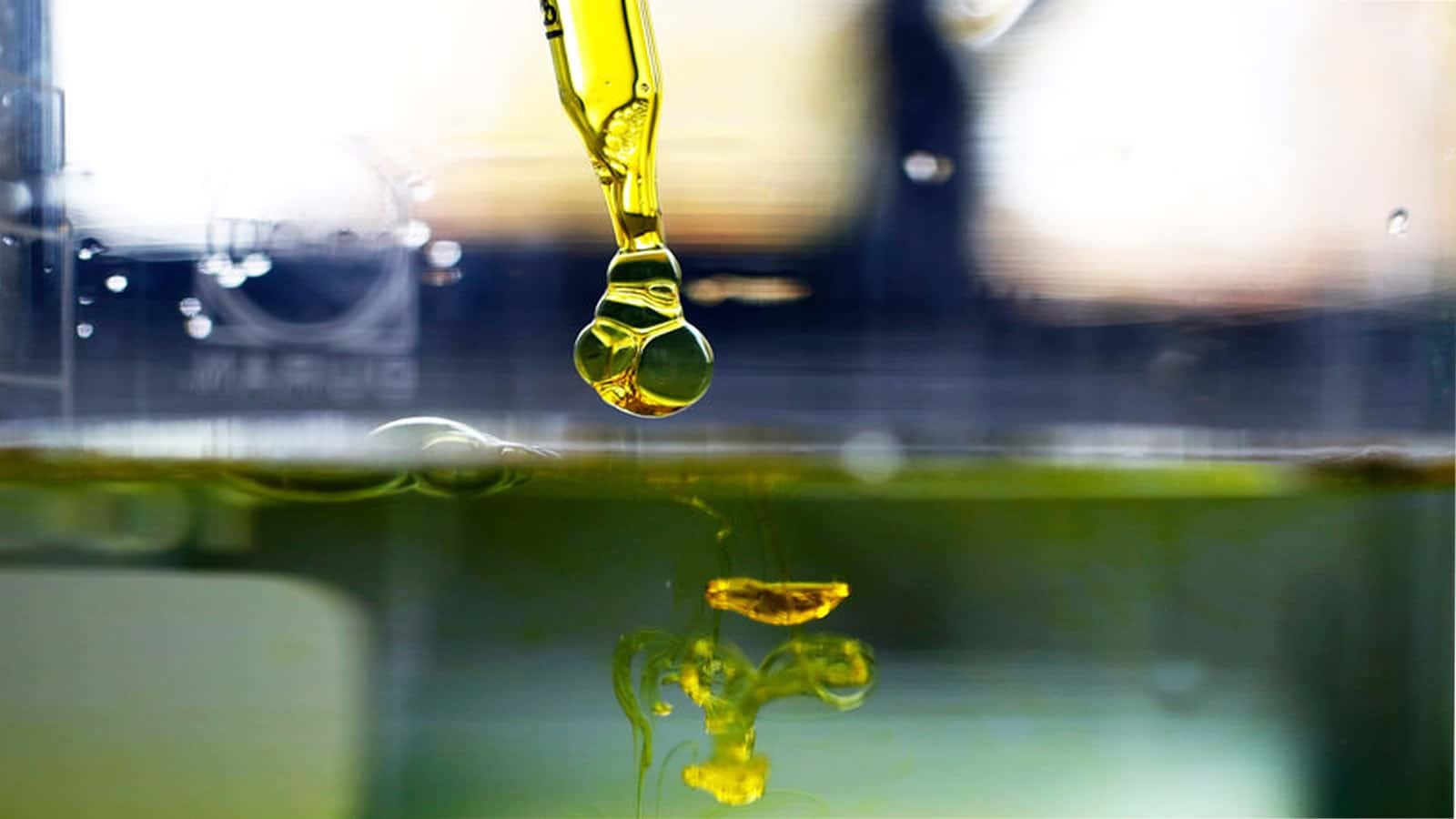photo of oil going into water