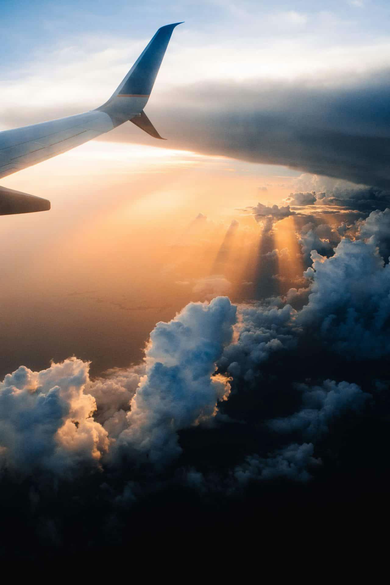 photo of the the sunset from a plane window