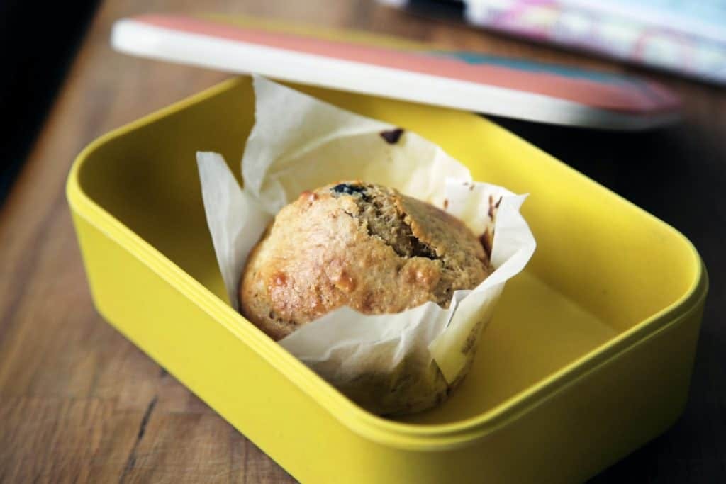 Muffin in a plastic container, by Caroline Attwood via Unsplash