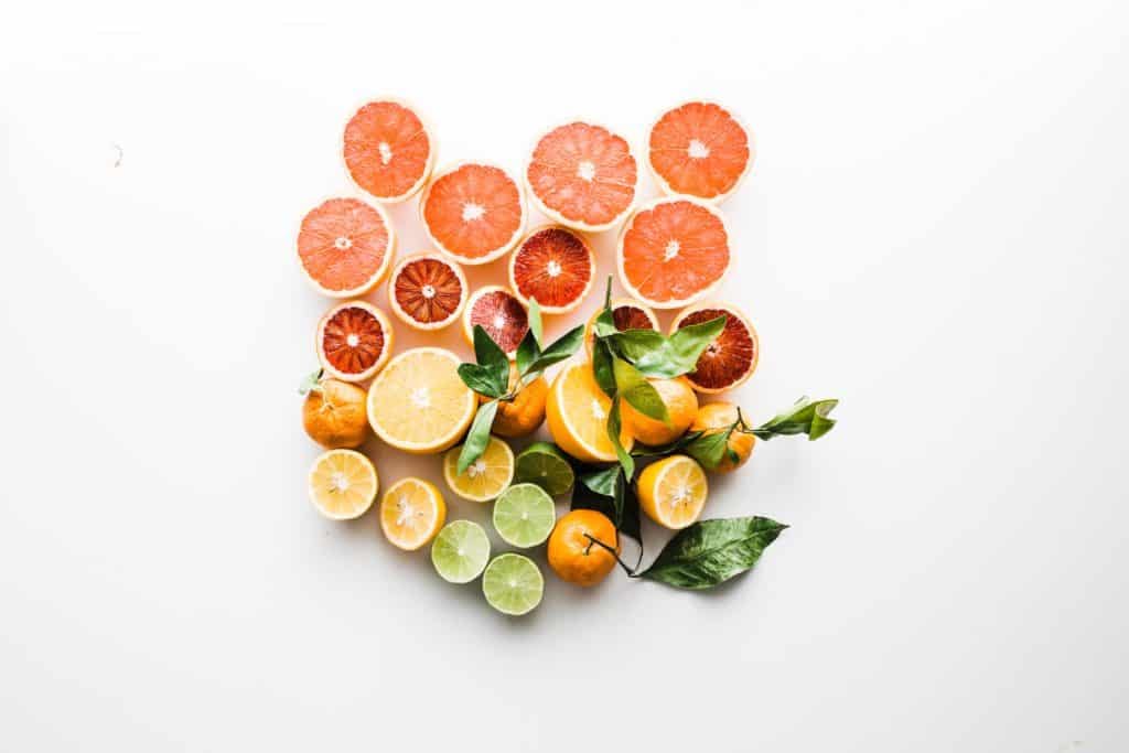 Assortment of citrus on white background