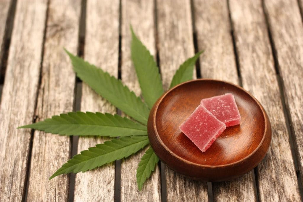 Gummy cannabis edibles with a marijuana leaf