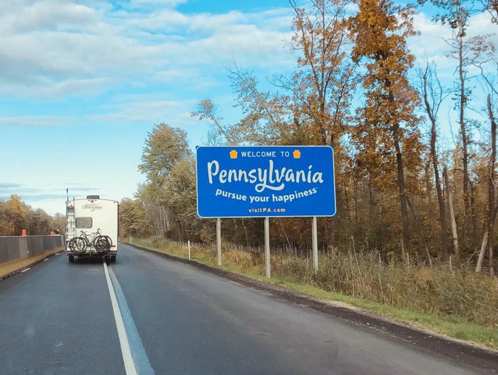 A Pennsylvania road sign, by Addy Mae via Unsplash