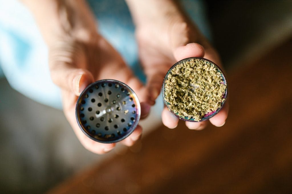 Ground cannabis, contained in a weed grinder, by Kindel Media via Pexels