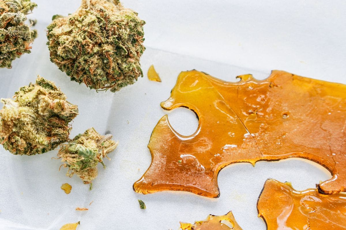 THC concentrate (wax/shatter/rosin) and buds, by High Grade Roots via iStock
