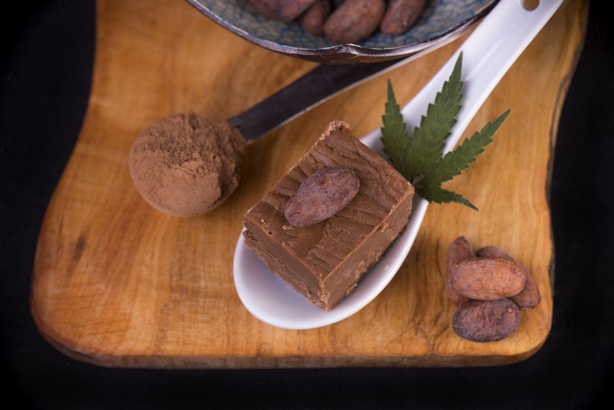 A wooden tray with cannabis-infused fudge, by rgbspace via iStock