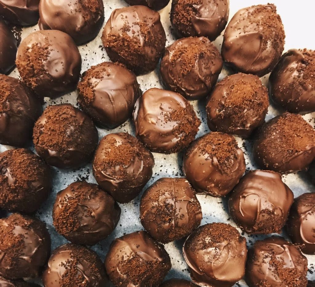 A selection of chocolate truffles, by Merve Aydin via Unsplash