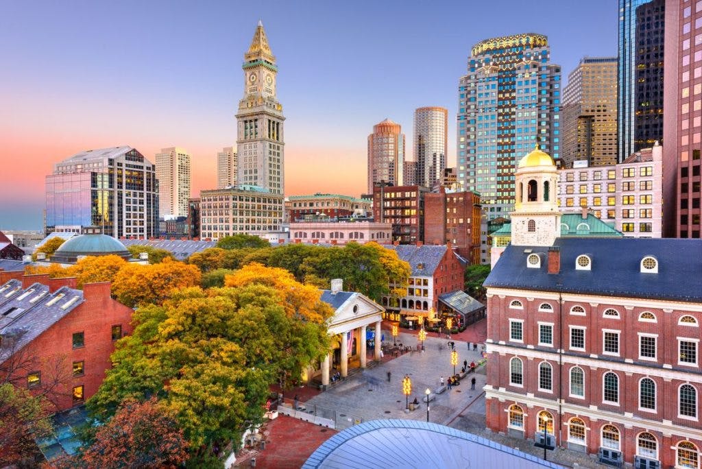 Boston, Massachusetts, USA skyline with Faneuil Hall and Quincy Market at dusk, by Sean Pavone via iStock
