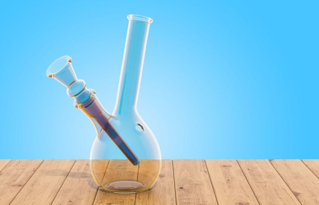 A clean bong on a blue background, by AlexLMX via iStock