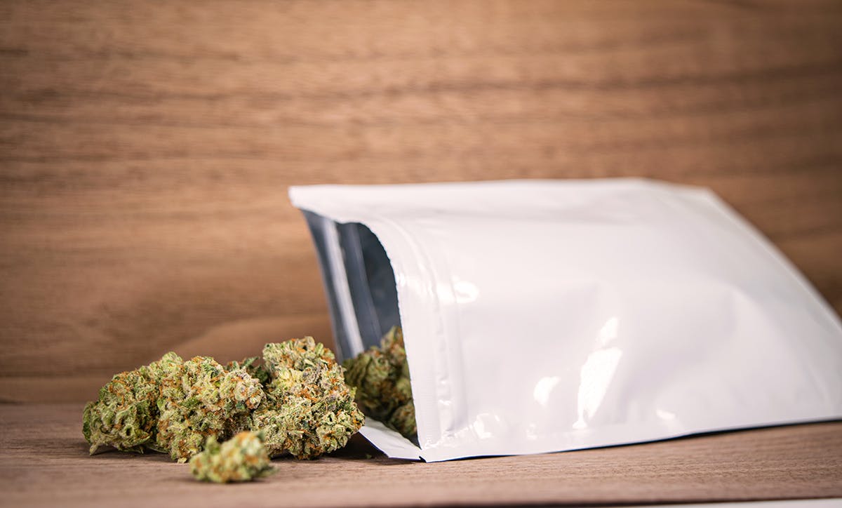 Cannabis spilling out of dispensary bag