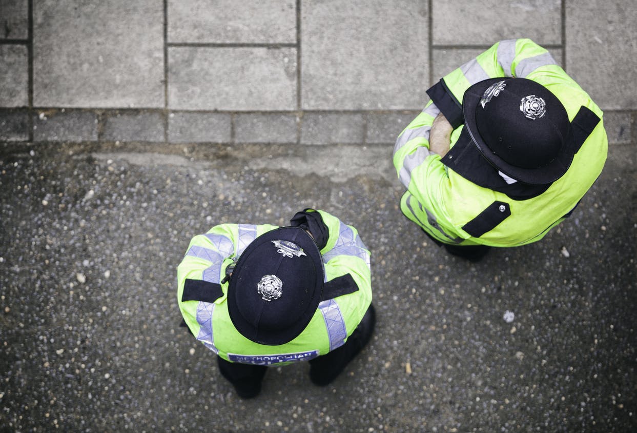 Looking down on two police officers in London