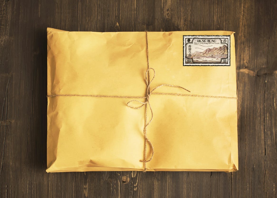 Vintage craft paper envelope tied up with string. Toned image. Toned image