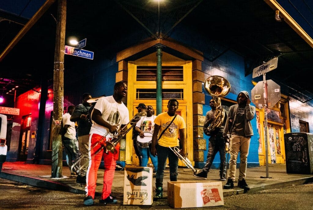A group of musicians plays in downtown New Orleans